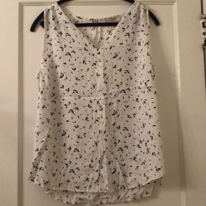 White sleeveless blouse